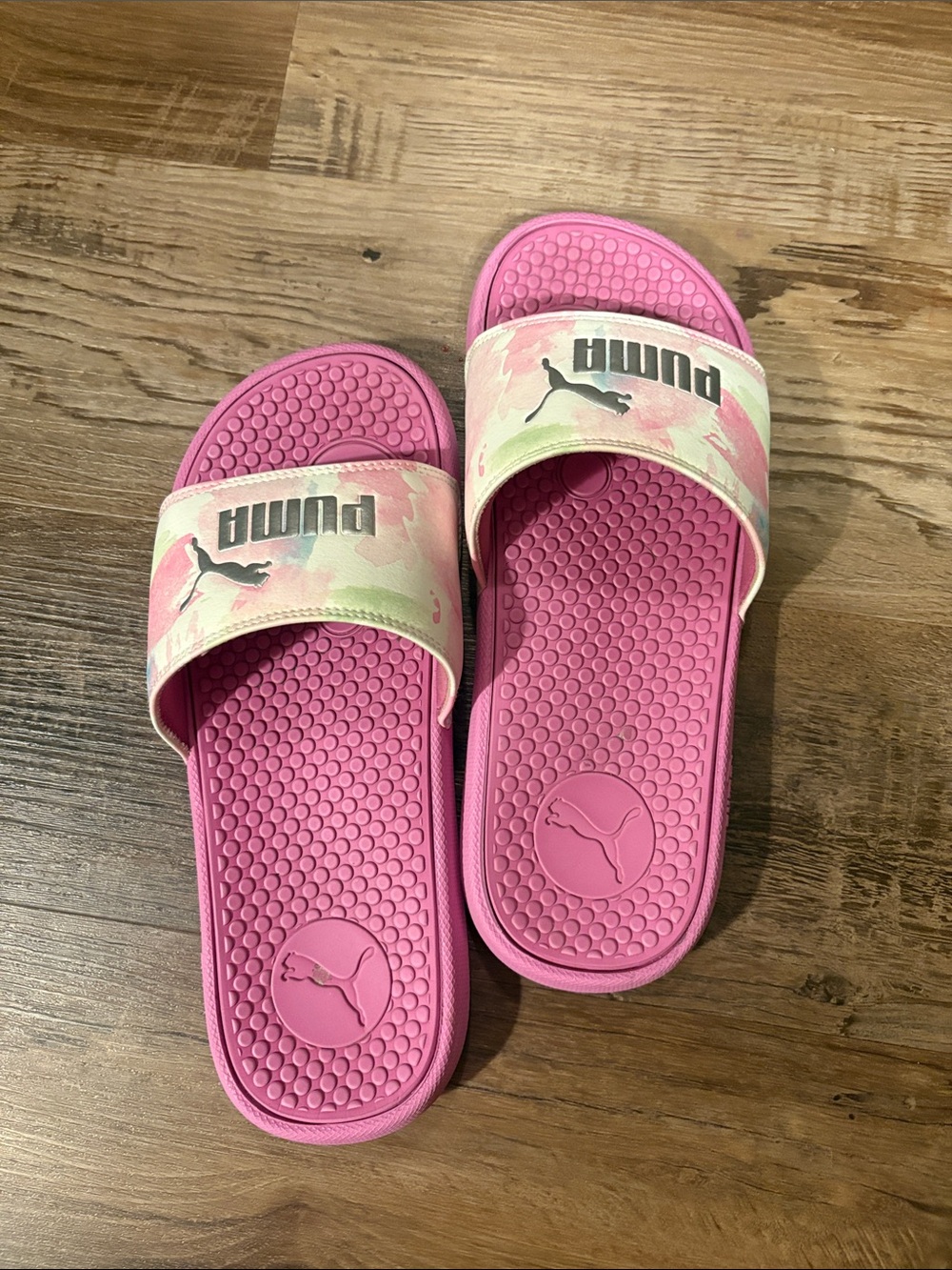 Puma women’s Pink Slide Sandals with Pastel Camouflage Strap
